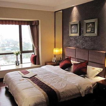 Sun Town Sun Joy Hotel Guangzhou Værelse billede